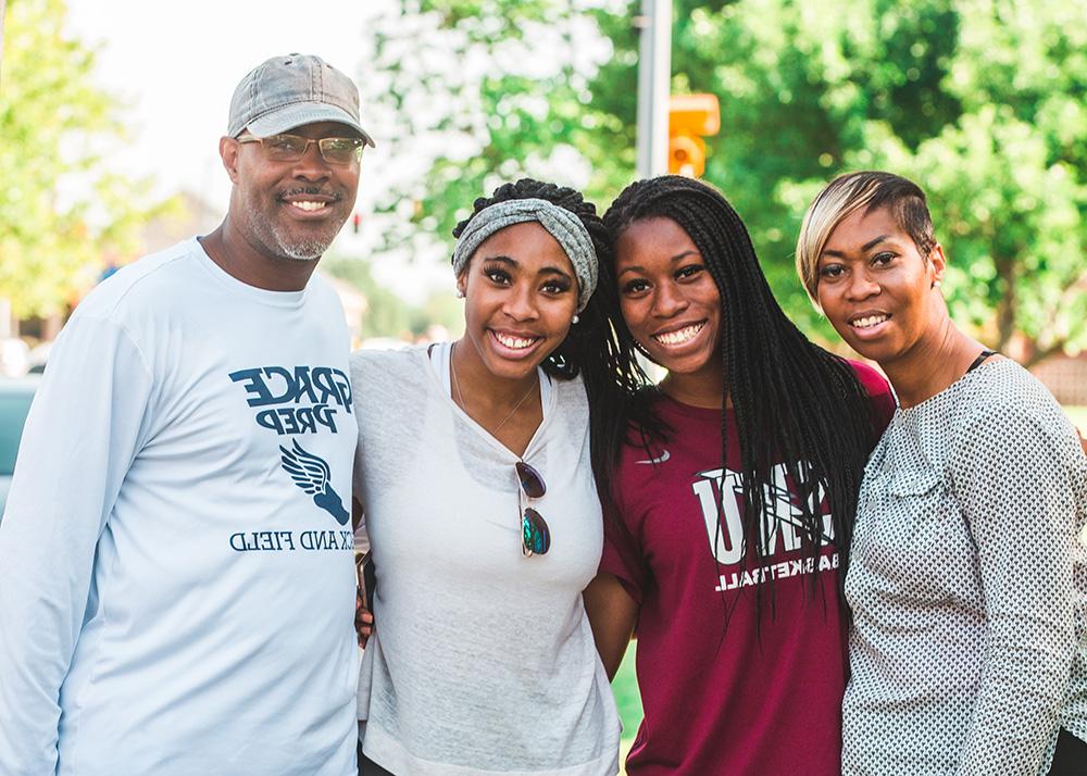 student with parents coming to college